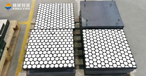 Z6尊龙特瓷耐磨陶瓷在矿石船埠装卸设备的防磨利用